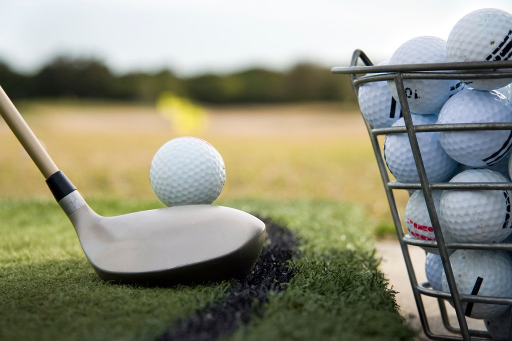 golfer at the driving range